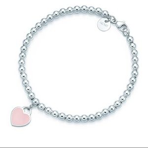 Tiffany & Co beaded bracelet with pink charm